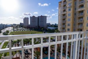 a balcony with a view of a city at The Point Hotel & Suites - 705S Luxury - Pool view - Close to Universal in Orlando