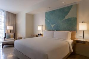 Rúm í herbergi á JW Marriott Panama