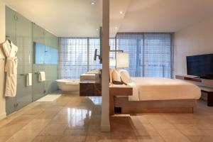Rúm í herbergi á JW Marriott Panama
