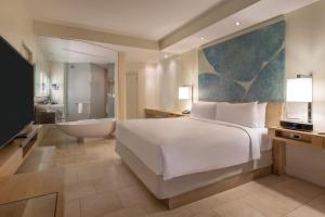 Rúm í herbergi á JW Marriott Panama