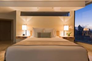 Rúm í herbergi á JW Marriott Panama