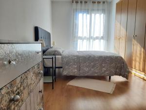 Letto o letti in una camera di FiveStepsToSea - Beach Apartment Valencia