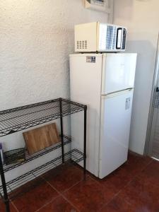 ครัวหรือมุมครัวของ Apartamento 2 ambientes + baño Las Toscas SUR