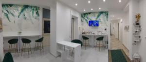 TV a/nebo společenská místnost v ubytování PANORAMICO