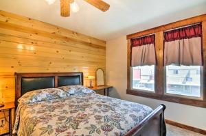 a bedroom with a bed and a window at Updated Main St Apt Near Fishlake and Capitol Reef! in Salina