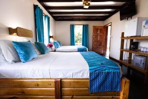 Letto o letti in una camera di Mango Inn Resort