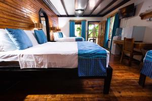 Letto o letti in una camera di Mango Inn Resort
