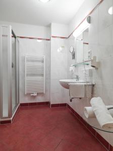 Kúpeľňa v ubytovaní Posthotel Strengen am Arlberg