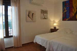 Posteľ alebo postele v izbe v ubytovaní Villa María Elena, en Fuente del Gallo + 21 fotografií