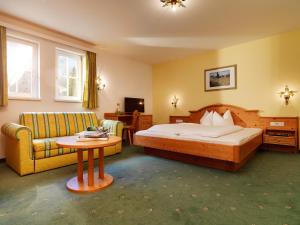 Posteľ alebo postele v izbe v ubytovaní Posthotel Strengen am Arlberg