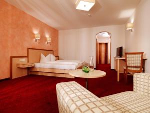 Posteľ alebo postele v izbe v ubytovaní Posthotel Strengen am Arlberg