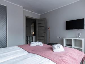 Postel nebo postele na pokoji v ubytování PARK HOTEL VILNIUS