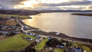 an aerial view of a large body of water at Tigh Na Mara Holiday Home in Aultbea +11 photos