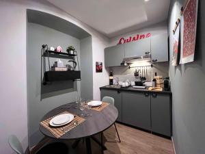 Nhà bếp/bếp nhỏ tại Giano Host - Capro