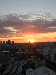 El amanecer o atardecer visto desde el departamento