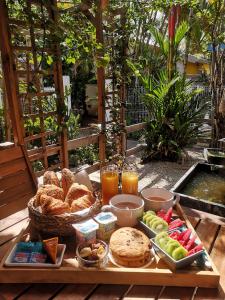 a tray of bread and other foods on a table at Brise Marine in Sainte-Luce +46 photos