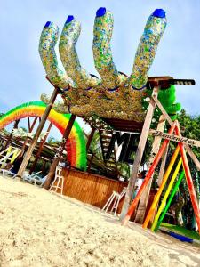 a ride at a carnival on the beach at MIRADOR DE BARU in Cartagena de Indias