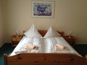 Postel nebo postele na pokoji v ubytování Yumi Hotel Sushi-Steaks & Friends