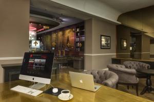 TV a/nebo společenská místnost v ubytování Plaza Hotel Lucchesi