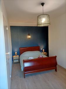 Postel nebo postele na pokoji v ubytování Chez Mélanie et Julien