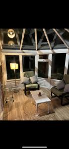 a living room with a couch and a coffee table at Ramulligan Cottage in Cavan