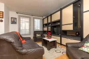 Posezení v ubytování Sisplac Apartment