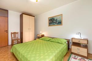 Postel nebo postele na pokoji v ubytování Sisplac Apartment