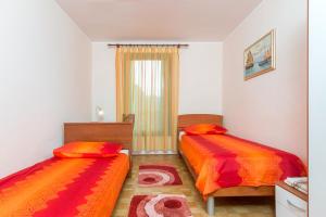 Postel nebo postele na pokoji v ubytování Sisplac Apartment