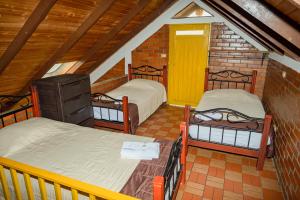 Postel nebo postele na pokoji v ubytování Ecovilla Cali