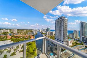 a view from the balcony of a condo in the city at BeachWalk Resort #2902 - WATERFRONT RESORT HOME with DIRECT OCEAN VIEW in Hallandale Beach