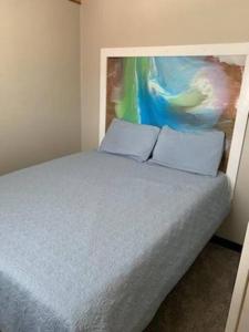 Un pat sau paturi într-o cameră la 1 FISH
