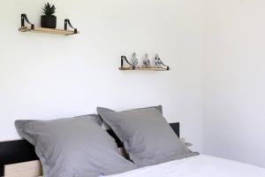 Posteľ alebo postele v izbe v ubytovaní Coeur de Briquettes