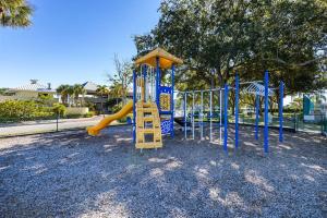a playground with a slide in a park at Your stay on the Bay! in Ruskin