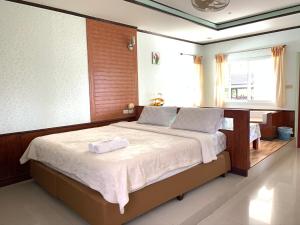Postel nebo postele na pokoji v ubytování Suanpai Resort Sattahip