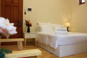 Postel nebo postele na pokoji v ubytování Omirita Resort Dalat