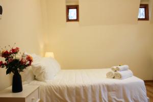 Postel nebo postele na pokoji v ubytování Omirita Resort Dalat