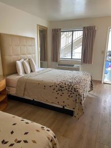 Letto o letti in una camera di The Virginian Inn Moab Downtown