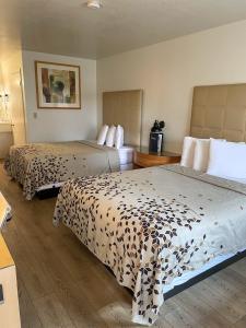 Letto o letti in una camera di The Virginian Inn Moab Downtown