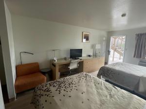 Letto o letti in una camera di The Virginian Inn Moab Downtown