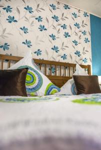 מיטה או מיטות בחדר ב-Hotel-Gasthof Wilder Mann