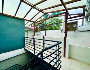 a balcony with a metal railing on a building at Armenian Guest House by LOLZ for 22pax in George Town