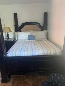 En eller flere senge i et værelse på Paradise Oasis2
