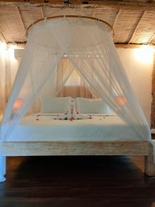 Postel nebo postele na pokoji v ubytování Villa Manis