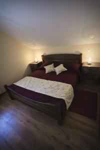 Postel nebo postele na pokoji v ubytování Merkež Guest House