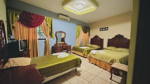 Imagen de la galería de HOTEL CUNA MAYA B y B, en Copan Ruinas