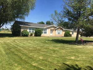 a house with a large lawn in front of it at Spacious Peaceful Country Home 1 Mile from Town 
