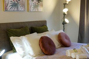 Postel nebo postele na pokoji v ubytování Verona Suites and Rooms