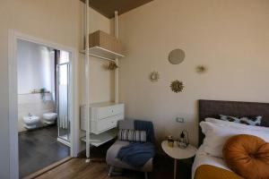 Postel nebo postele na pokoji v ubytování Verona Suites and Rooms