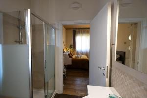 Koupelna v ubytování Verona Suites and Rooms