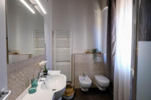Koupelna v ubytování Verona Suites and Rooms